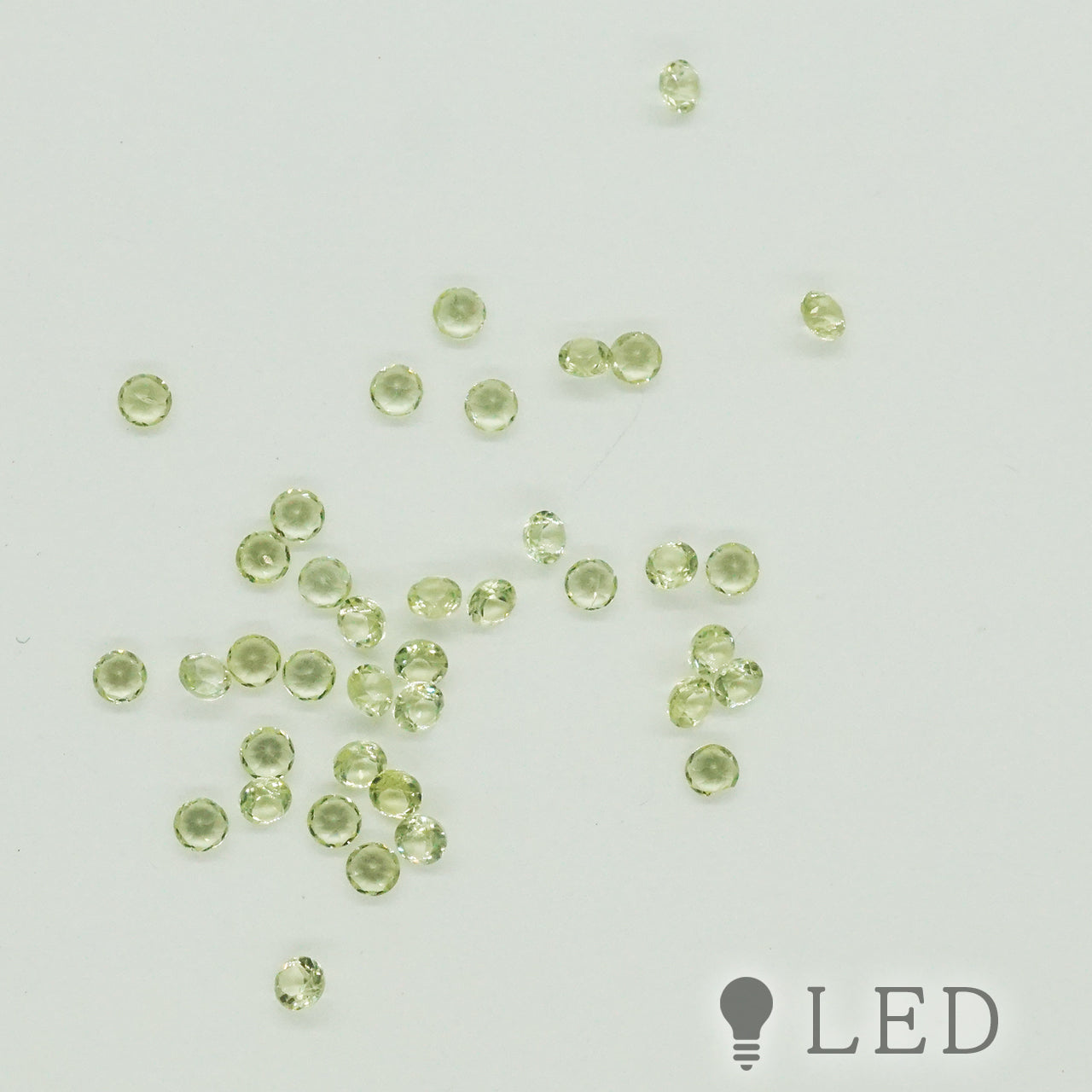 ペリドット ラウンド 1.8mm 0.02ct 9粒セット