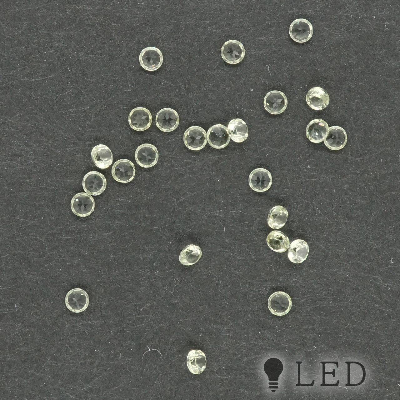 ペリドット ラウンド 1.8mm 0.02ct 9粒セット